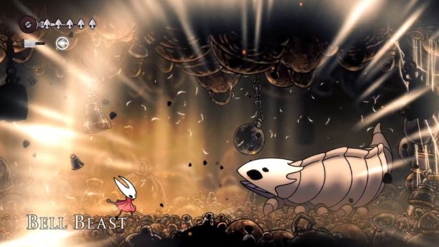 A player faces off against the Bell Beast boss in Hollow Knight: Silksong